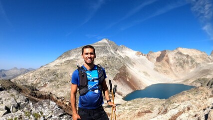 young man hiking in the mountains