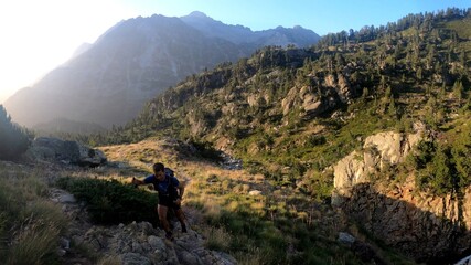 young man hiking in the mountains