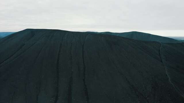 Volcanic rock landfill of Hverfjall in Iceland, reveal drone shot 