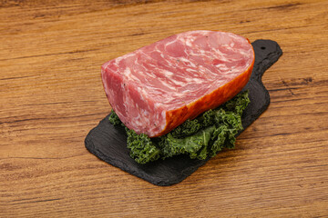 Beef ham piece over board