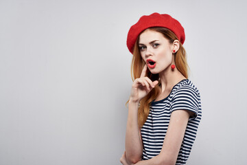 beautiful woman wearing a red hat makeup France Europe fashion posing isolated background