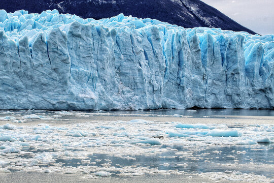 High angle shot of the icy waters in the foreground and Lambert glacier in the background
