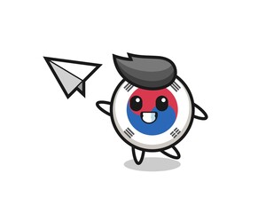 south korea flag cartoon character throwing paper airplane