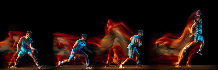 Development of motions. Young man, football soccer player in action isolated over dark background...