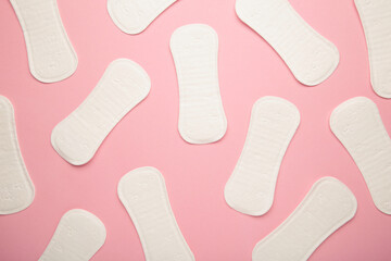 Menstruation cycle, feminine hygiene and protection, sanitary pad on pink background, top view, flat layout