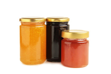 Assortment of jams, seasonal fresh berries and fruits isolated on white background.