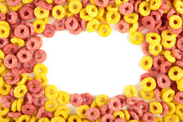 Colorful cereal loop rings, breakfast food isolated on white background.