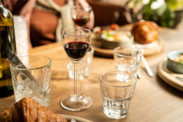 Glass with sherry wine on dinner table