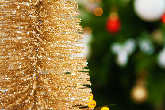 golden tree, bokeh, background, toys, merry christmas, happy new year. 2022. Lights, sparkles and glare. christmas tree