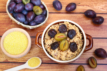 Millet with plums. A warm autumn breakfast
