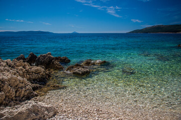 Fototapeta na wymiar Seascape with beach and rocks