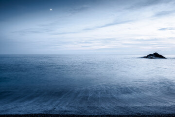 Sea at night. Long exposure. Blurr of sea waves. Zen.