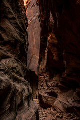 Wide Shot Of The Tall Walls of Buckskin Gulch With Hiker Standing On The Base