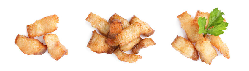 Set with tasty fried cracklings on white background, top view. Cooked pork lard