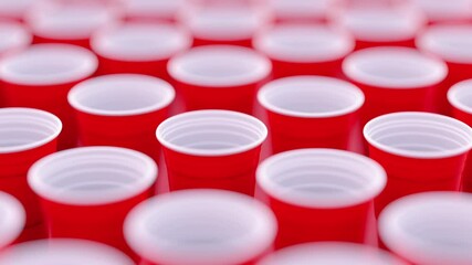 Red plastic cups in large quantities, Movement of the dolly camera forward. Camera showing stack of red cups. 3d realistic Animation in Full HD 1920x1080.