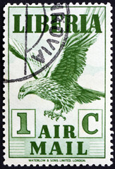 Postage stamp Liberia 1938 eagle in flight - obrazy, fototapety, plakaty