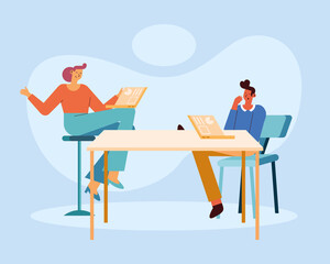 woman and man with laptops planning