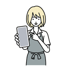立ってスマートフォンを指差してこちらに向けて見せているカフェ店員の女性