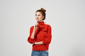 pretty woman in a red sweater attractive look