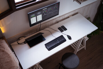 Convenient workplace of cryptocurrency trader at home