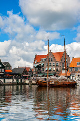 Fototapeta premium Clasic sail boats in the harbour of Volendam, a touristic fishing town in The Netherlands