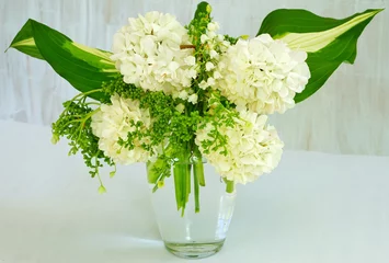 Foto op Aluminium Green and white spring bouquet with viburnum and lily-of-the-valley © eqroy