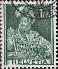 Switzerland - Circa 1941: a postage stamp printed in the Switzerland showing a portrait of Colonel...