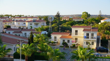 southern town small houses palm trees resort vacation summer vacation sun villas
