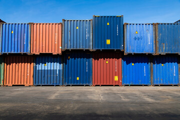 Marine and carrier insurance concept. Cargo container yard. cargo shipping container box in logistic shipping yard. colorful cargo container stacks in shipping port.
