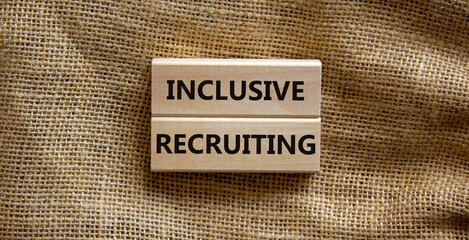 Inclusive recruiting symbol. Wooden blocks with words Inclusive recruiting on beautiful canvas...