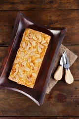 Foto op Plexiglas Lekker Holand Cake or Dutch Butter Cake or Holland Boterkoek with almond slice. © menik