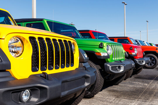 Jeep Wranglers on display at a Chrysler Jeep dealership. The subsidiaries of FCA are Chrysler, Dodge, Jeep, and Ram.