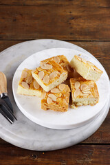 Lekker Holand Cake or Dutch Butter Cake or Holland Boterkoek with almond slice.