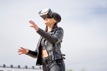 Young woman wearing virtual reality glasses