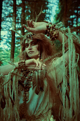Fototapeta na wymiar tribal dance in a forest