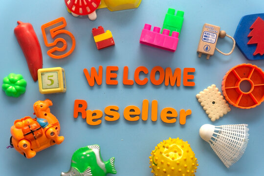 Various kinds of children`s toys, with toy letters arranged and forming the word `Welcome Reseller`, which is needed by the marketplace who wants to hold a collaboration program