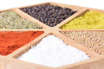 Colorful mix of spices in a wooden container. Food. Oriental spices.