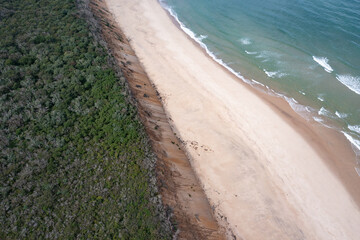 The cold, nutrient-filled water of the Atlantic Ocean washes onto the scenic beach of Cape Cod, Massachusetts. This beautiful peninsula is a popular vacation destination during summer months.