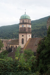 Fototapeta na wymiar view of church bell tower in the famous alsatian village of Kaysersberg in France