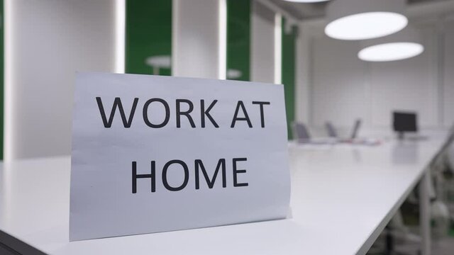 Close-up Work At Home Announcement In Empty Business Office Indoors. Modern Luxurious Company Premises With No People On Coronavirus Pandemic Lockdown. New Normal On Covid-19