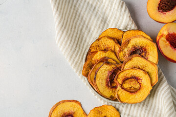 dried peaches on a light background