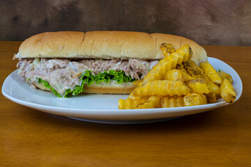 tuna sub with a side of fries
