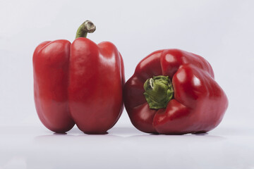 Large red bell pepper on a white isolated background. Bell pepper. 