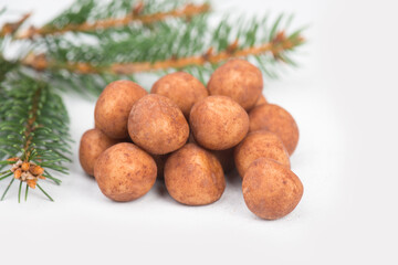 Marzipan potatoes, in german called Marzipankartoffeln, with cacao powder, sweets for christmas, empty copy space