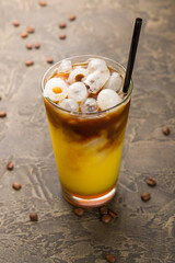 black coffee with orange juice with ice vertical
