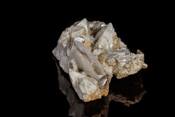 Macro mineral stone Snow quartz with calcite on a black background
