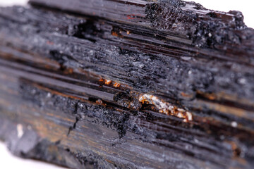 macro mineral stone sherle, schorl, black tourmaline on white background