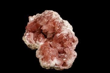 Macro mineral stone Pink Amethyst on a black background
