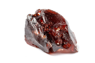 Macro mineral stone Garnet Spessartine on a white background