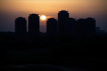 Bucharest skyline at sunset. Golden hour. Sunset. Vacaresti Natural Park.